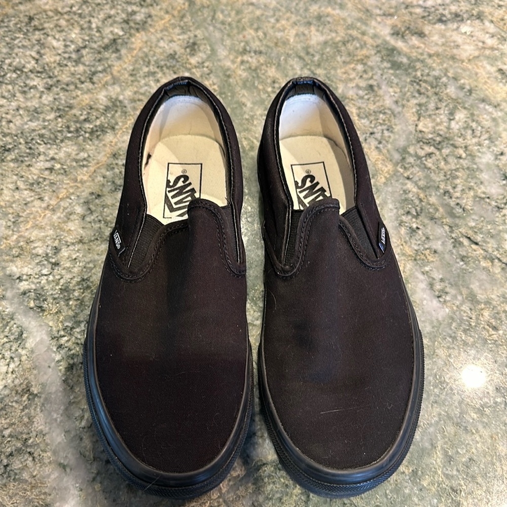 Vans all black slip on